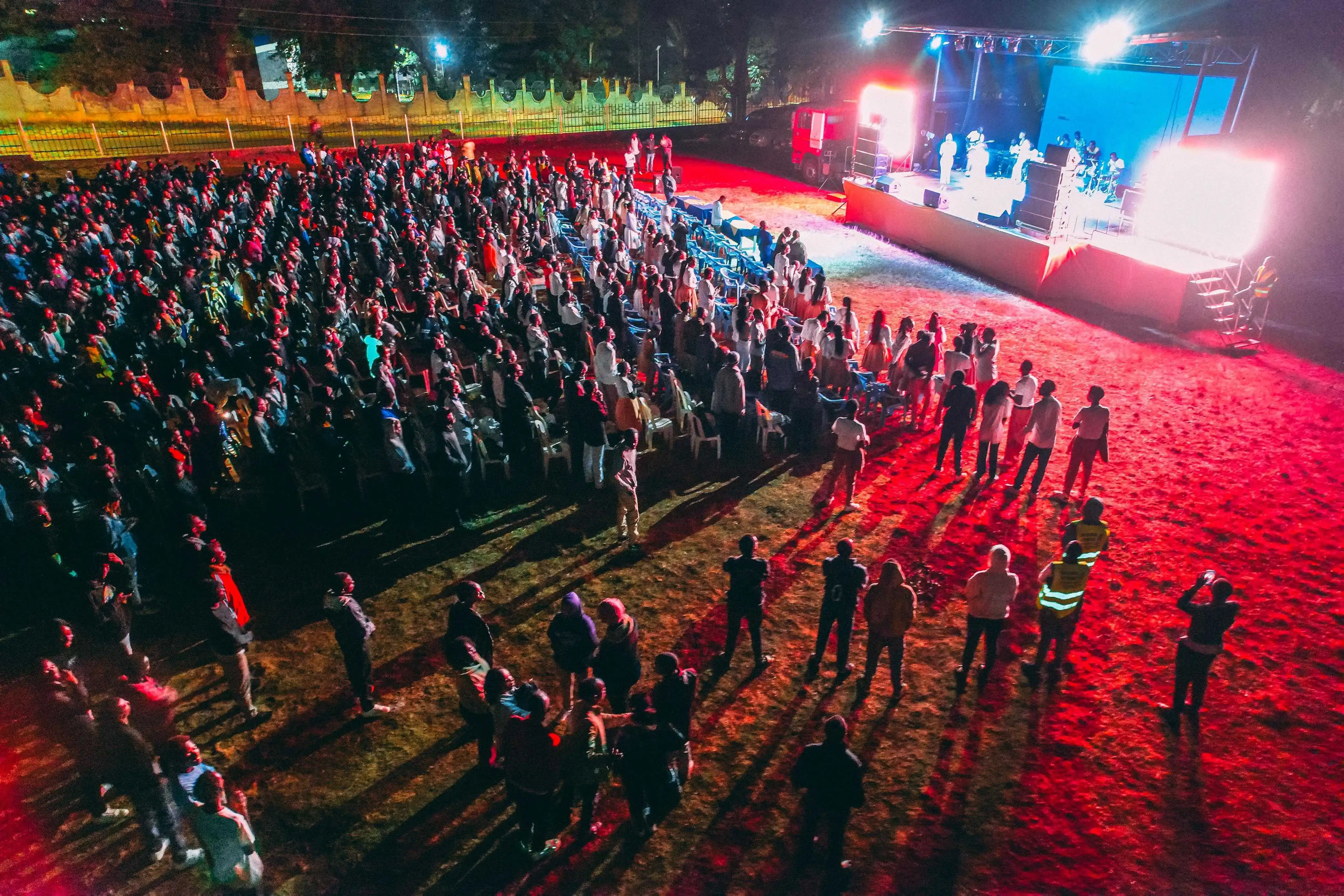 Large Transform Maisha outdoor gathering facing the stage